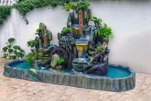 房子前面装假山喷泉风水